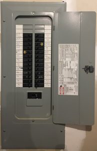 open breaker box with labeled circuit breakers