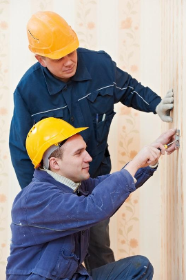 Electricians performing electrical service